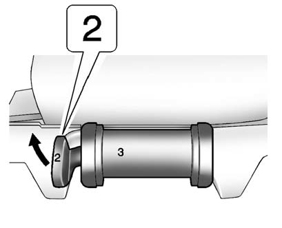 4. Unlatch the seat from the floor by lifting lever 2 next to the carrying