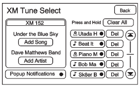 The XM Tune Select menu displays with options to store by the song title or the