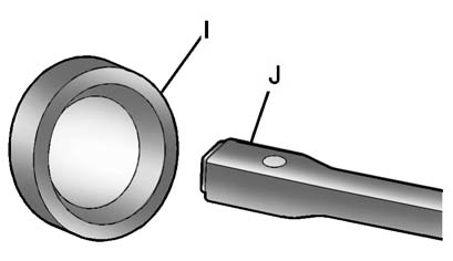 4. Insert the open end of the extension (J) through the hole in the rear bumper